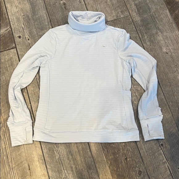 Nike s Therma-FIT Swift Element turtleneck - Picture 2 of 3
